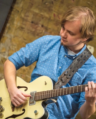 Alvin playing guitar